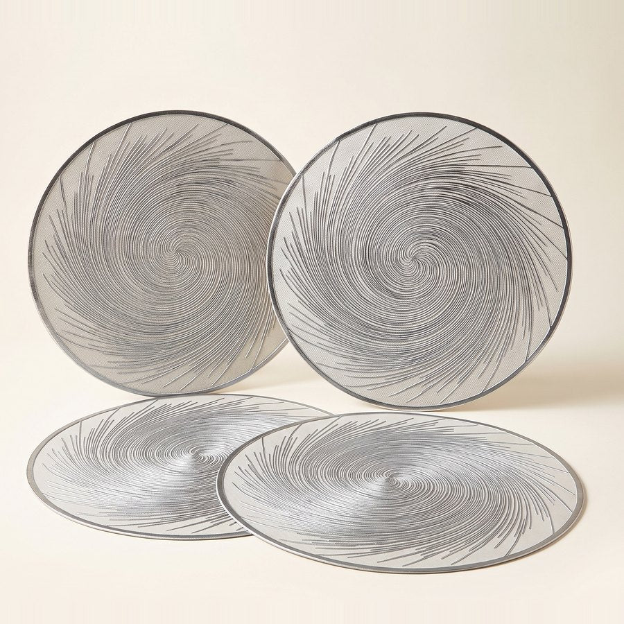 Set de cuatro individuales de mesa redondos, plateados, con diseño en espiral